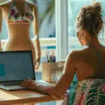 Woman working on a laptop, swimwear market analysis